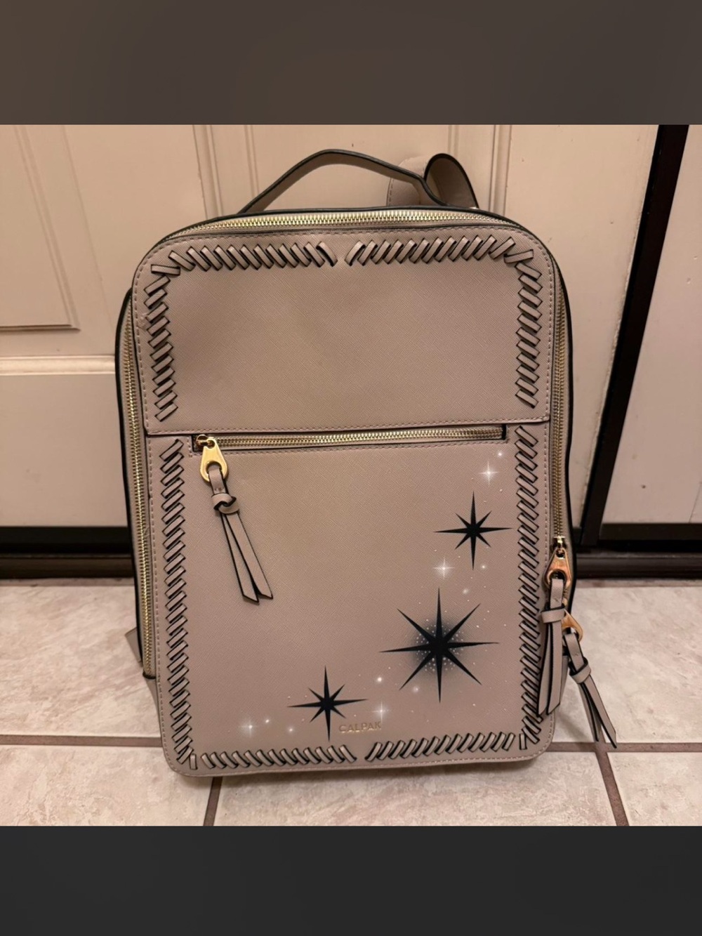 Calpak Taupe Star Motif Backpack with Whipstitch Trim